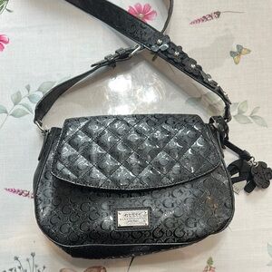 Guess Black Quilted floral Crossbody Bag with cheetah lining and bag charm